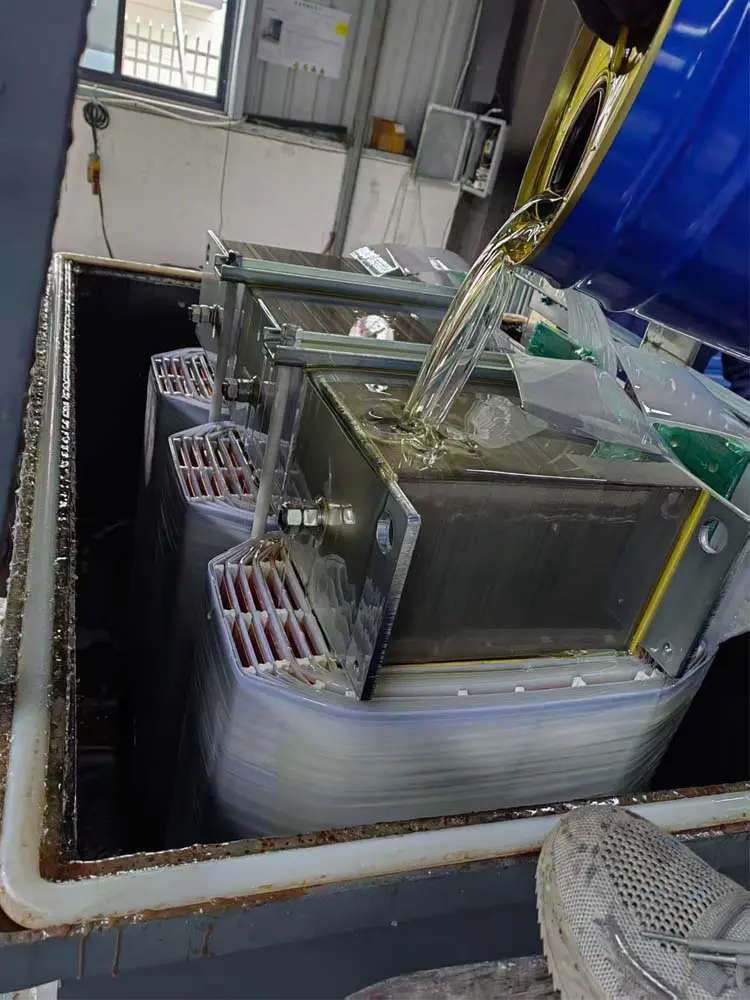 Transformer vacuum pressure impregnation process for insulation treatment during manufacturing