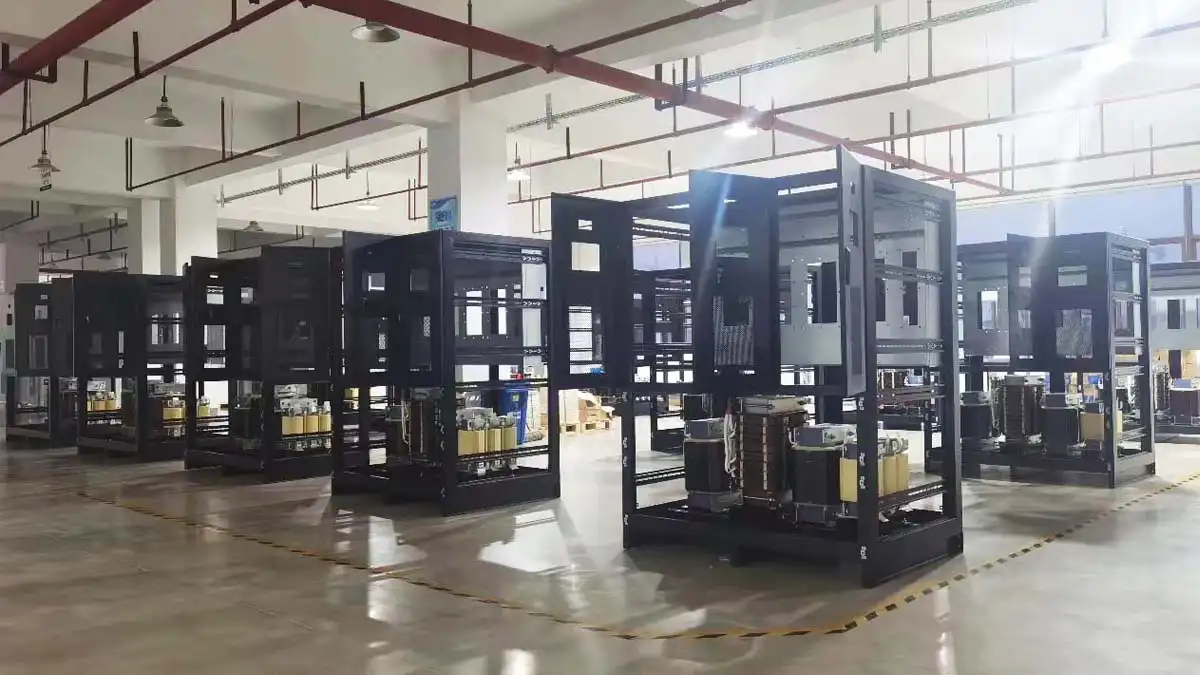 IGBT static voltage stabilizer cabinets during assembly at the manufacturing factory.