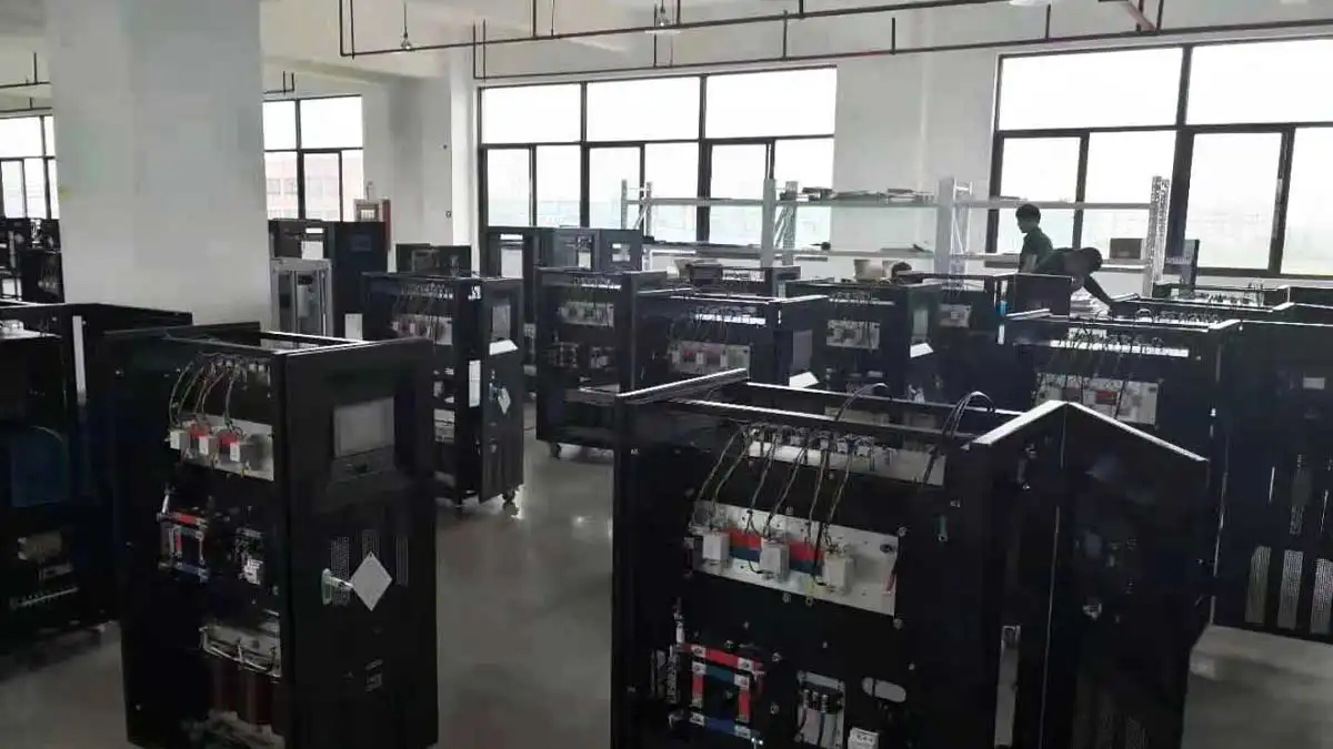 WVFP-33020 cabinets with exposed components and wiring during factory assembly.