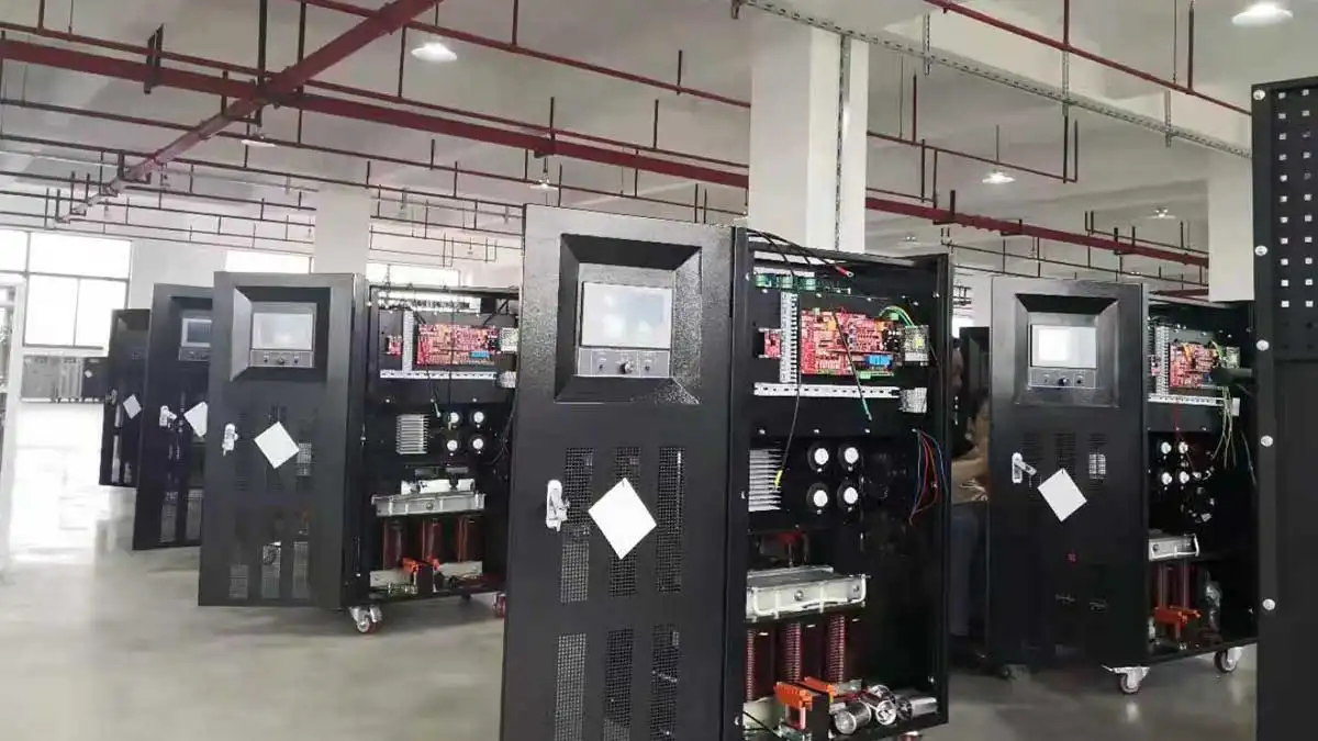 Rows of WVFP-33020 cabinets with open panels showing internal components and wiring.