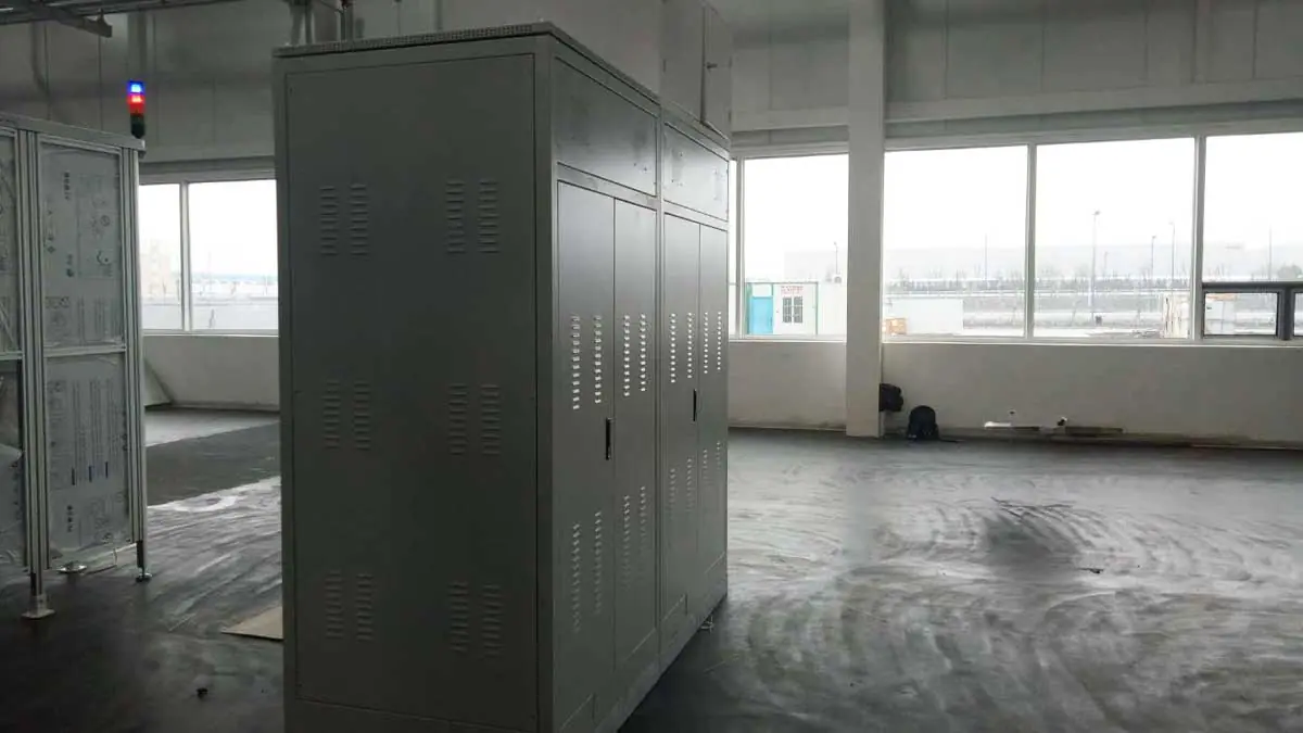 Side view of the installed 1200KVA industrial voltage stabilizer system