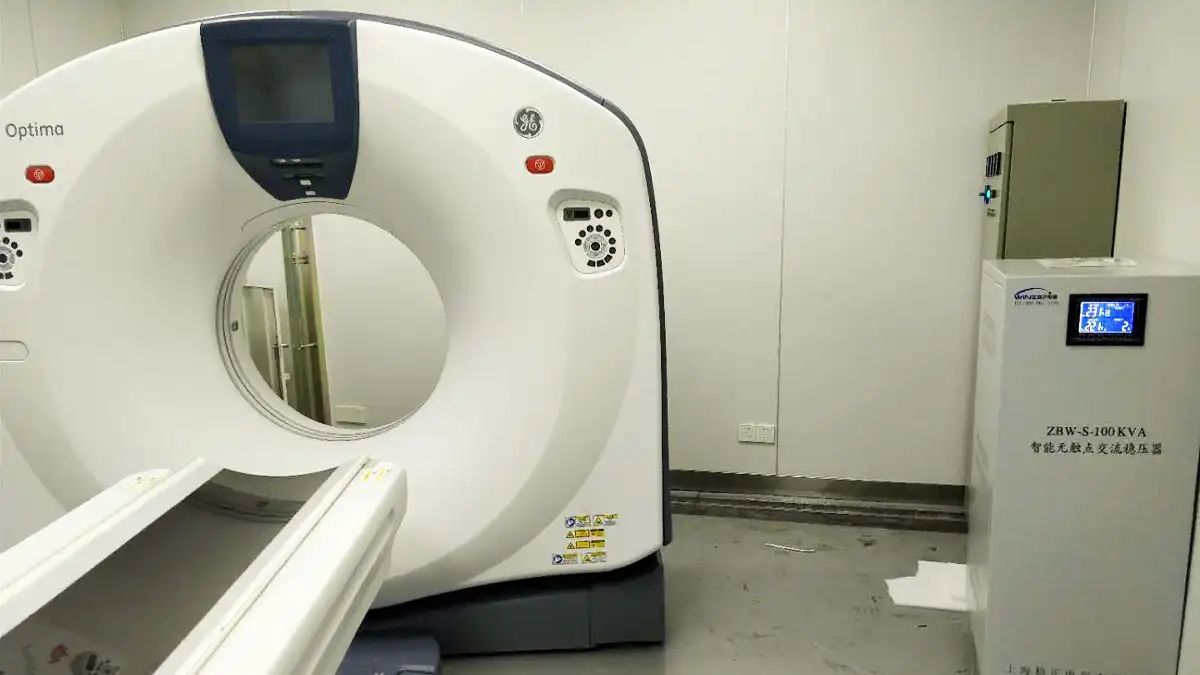 GE Optima 64-Slice CT Scanner voltage stabilization application reference