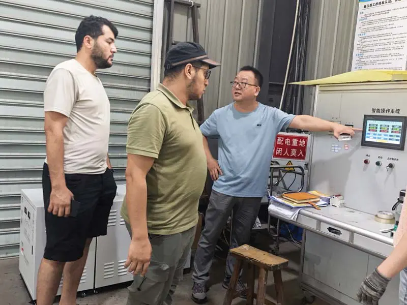 Customer inspecting industrial equipment testing facility