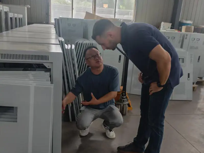 Customer technical discussion with engineers during factory visit